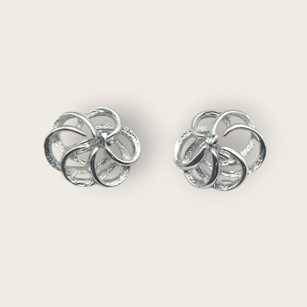 Sarah Coventry Silver Swirl Clip On Earrings Sculptural Knot Design
